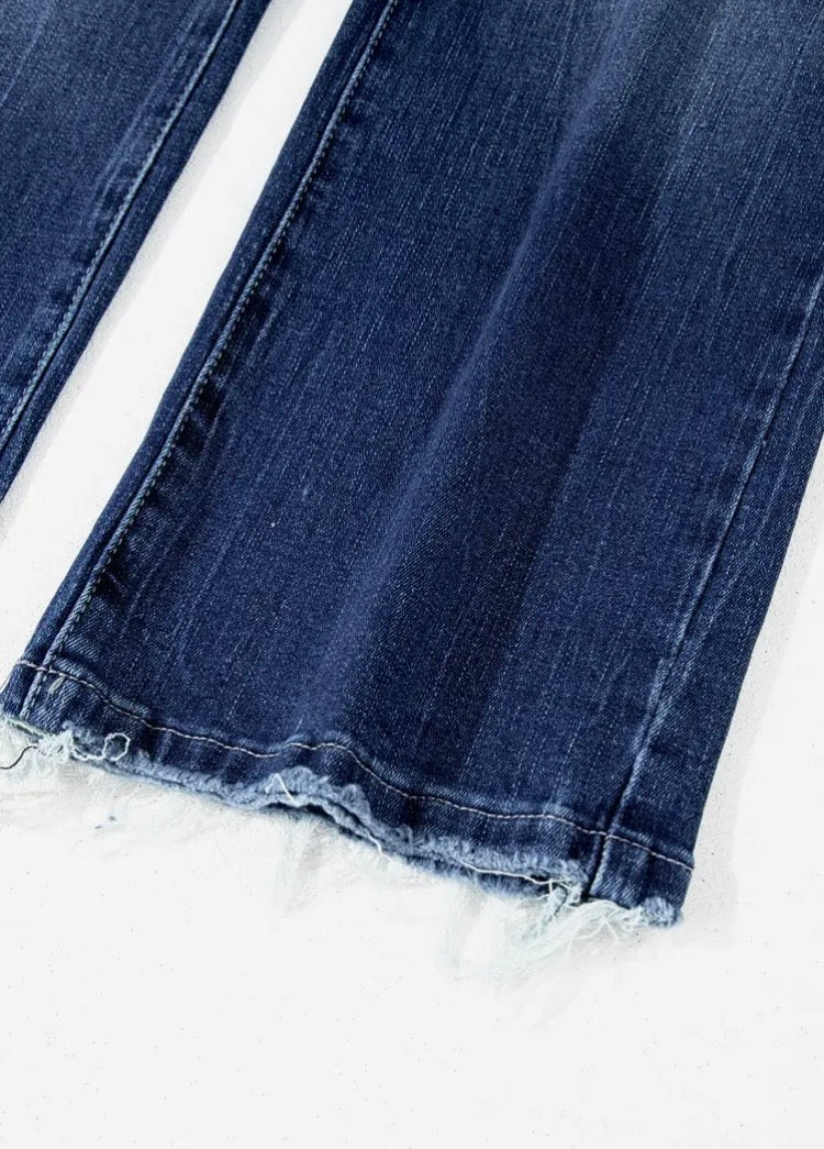 Delilah High Waisted Flared Jeans with Raw Hem