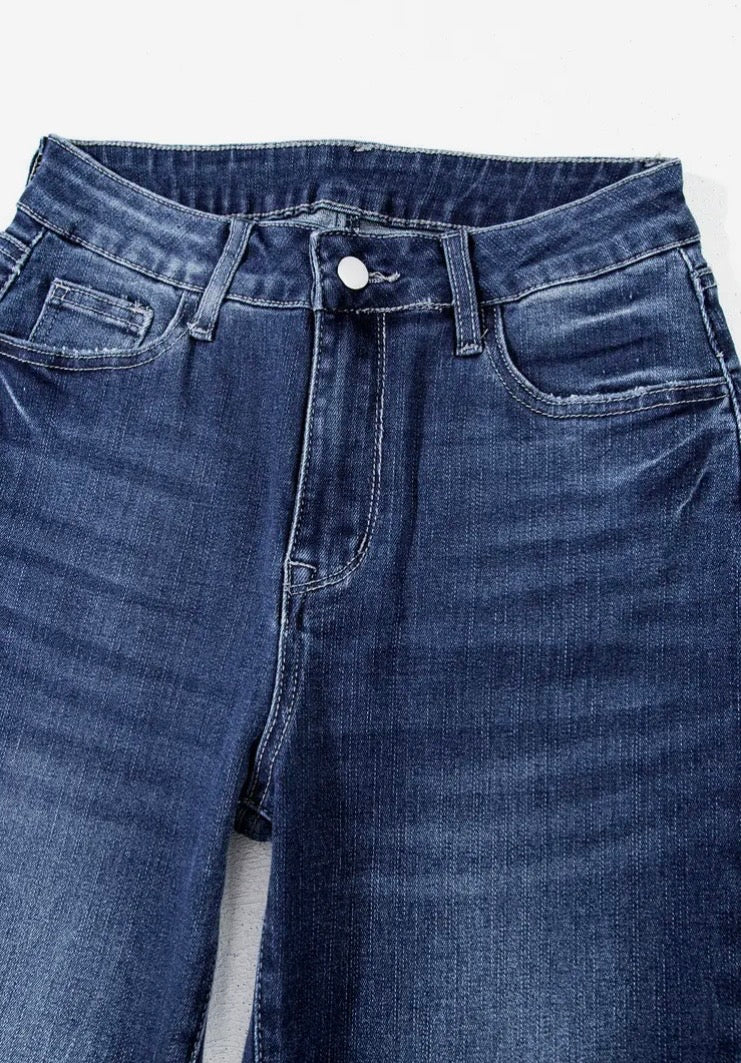 Delilah High Waisted Flared Jeans with Raw Hem